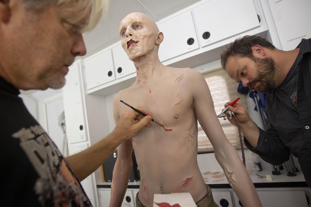 A cast member gets made up. Photo: AP