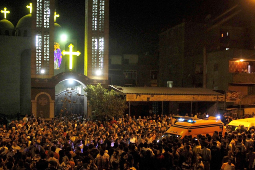 Gunmen fired at people leaving after a wedding at a Coptic Christian church. Photo: EPA