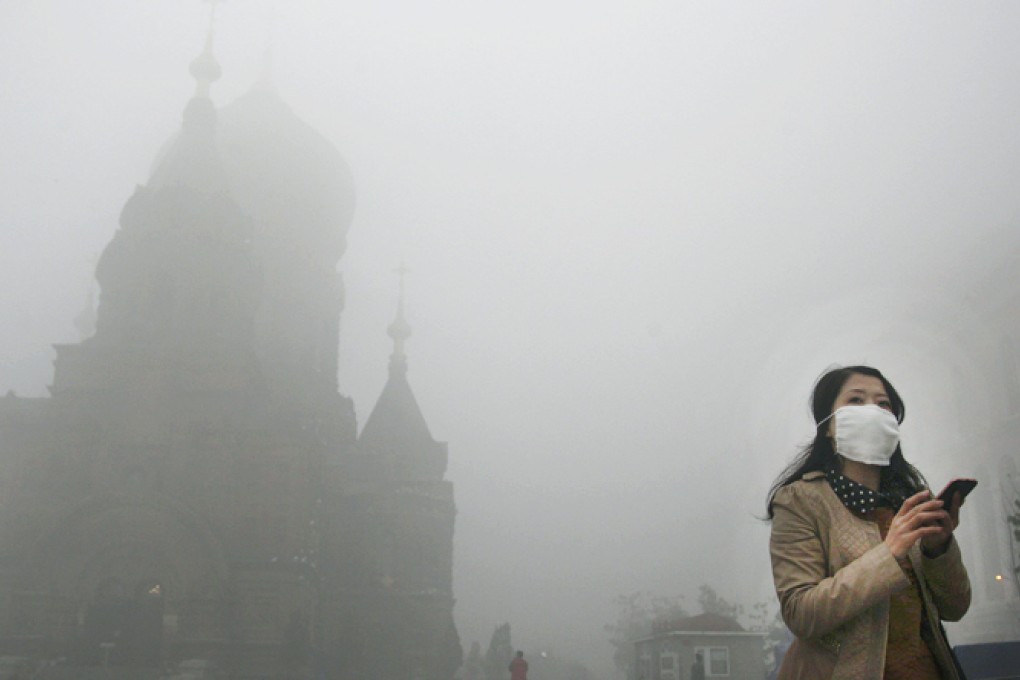 Harbin’s San Sophia church veiled by smog that cut visibility to below 10 metres. Photo: Reuters