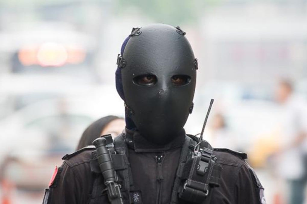 Ballistic masks are worn by soldiers to prevent shots to the head. Photo: DDN Japan