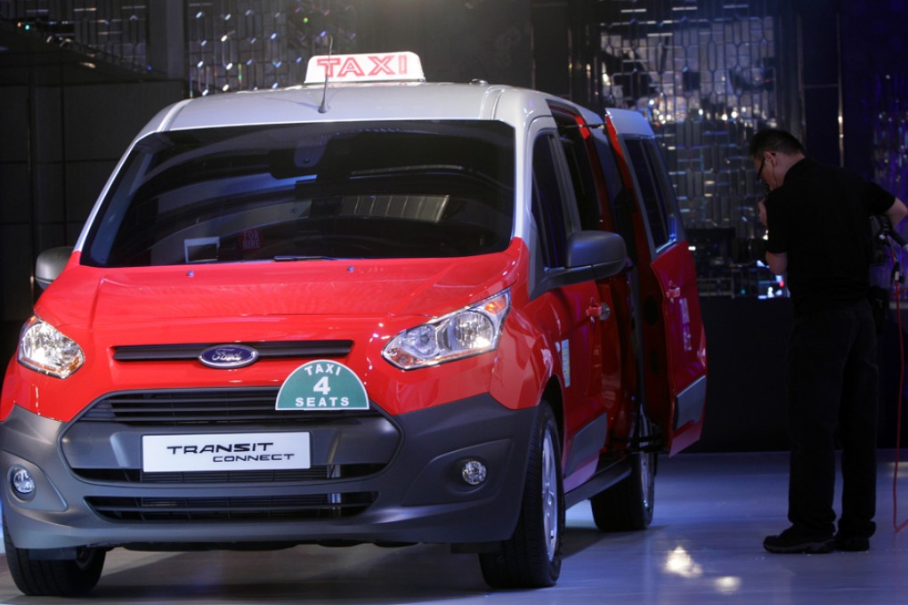 A Ford Transit Connect Taxi which is powered by LPG is displayed during a press conference in West Kowloon. Photo: David Wong