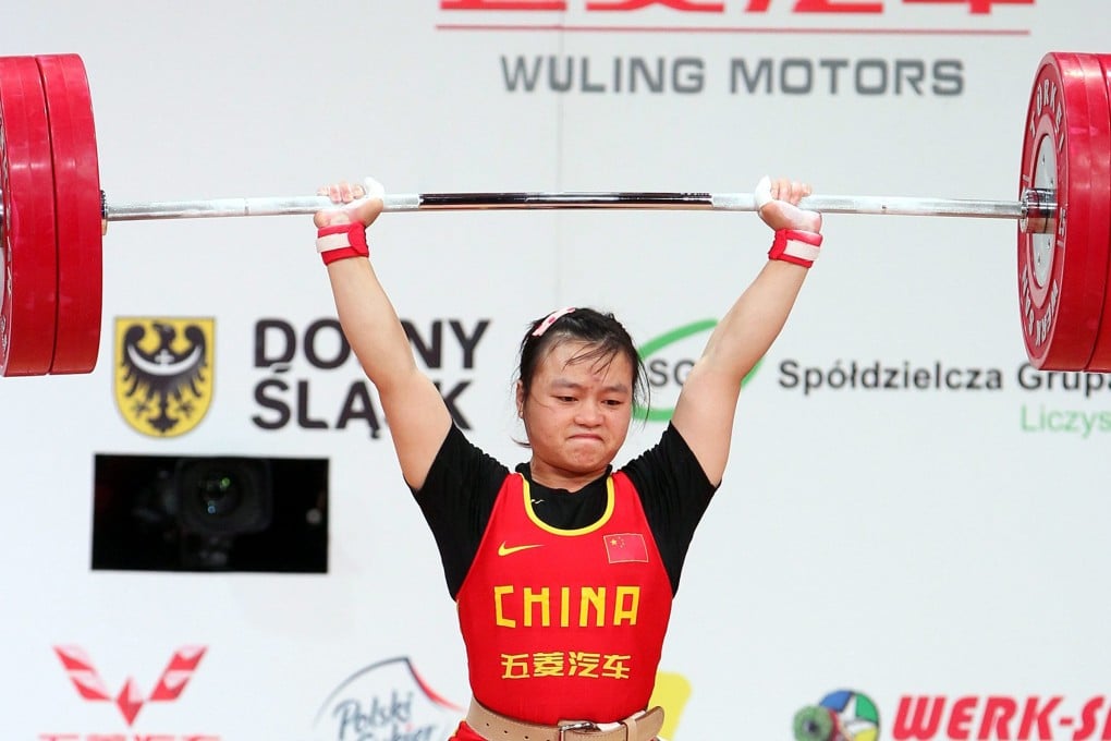Li Yajun during the clean and jerk discipline of the women's under 53kg category at the world weightlifting championships in Poland. Photo: EPA