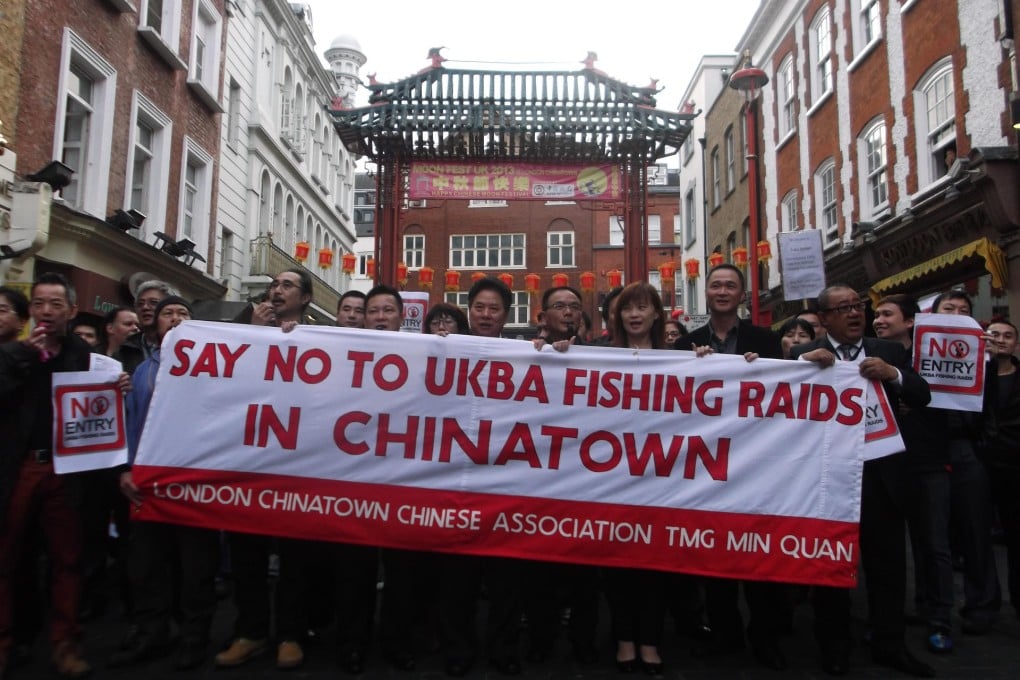Marchers protest in London's Chinatown against what they claim are heavy handed raids by UK Border Police. Photo: TengaiMedia