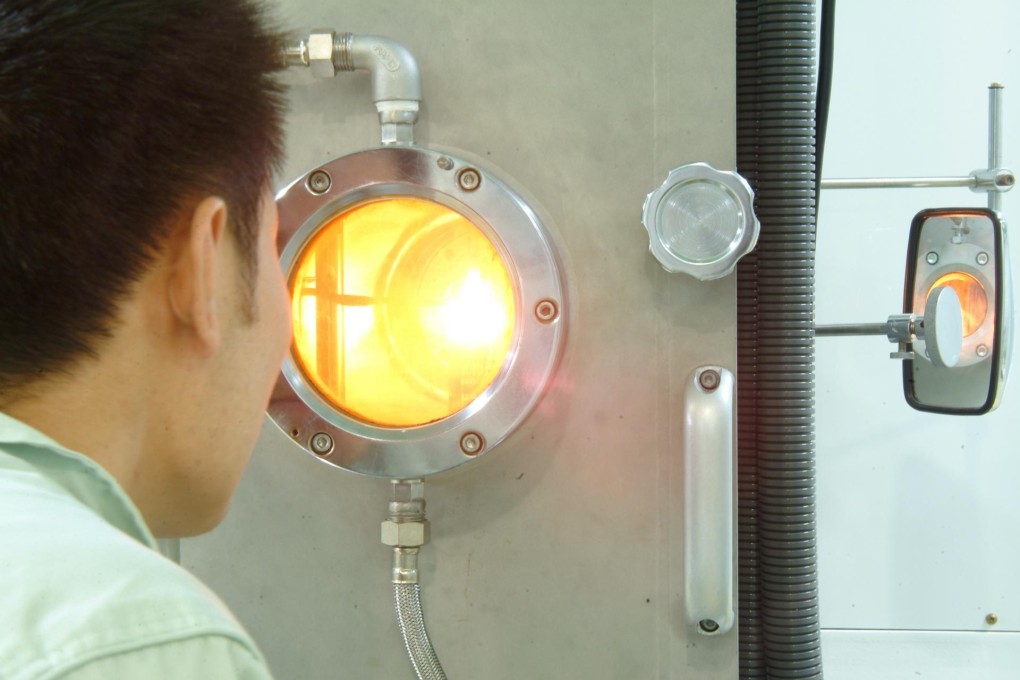 Jiangsu-based GCL-Poly Energy, the world's largest maker of polysilicon and solar wafers, has no plan to buy troubled companies in the industry. Photo: Bloomberg