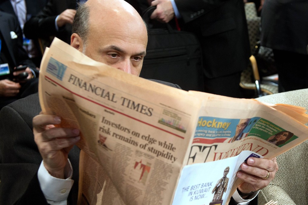 The Financial Times speculated on its front page last Friday that the Fed could begin cutting its asset purchases as early as December. Photo: AFP
