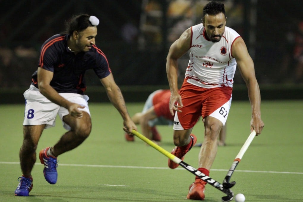 Sohail Abbas (right) goes through his paces at a training session in Happy Valley. Photo: David Wong