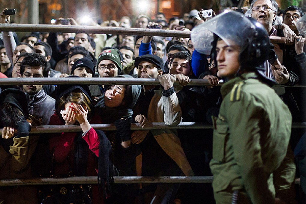 Onlookers at the execution in Tehran. Photo: AP