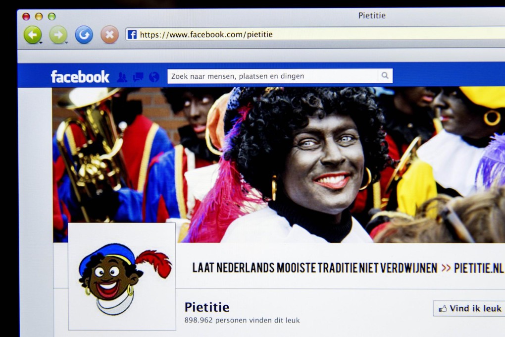 The Facebook page celebrates "Black Pete" clowns. Photo: AFP