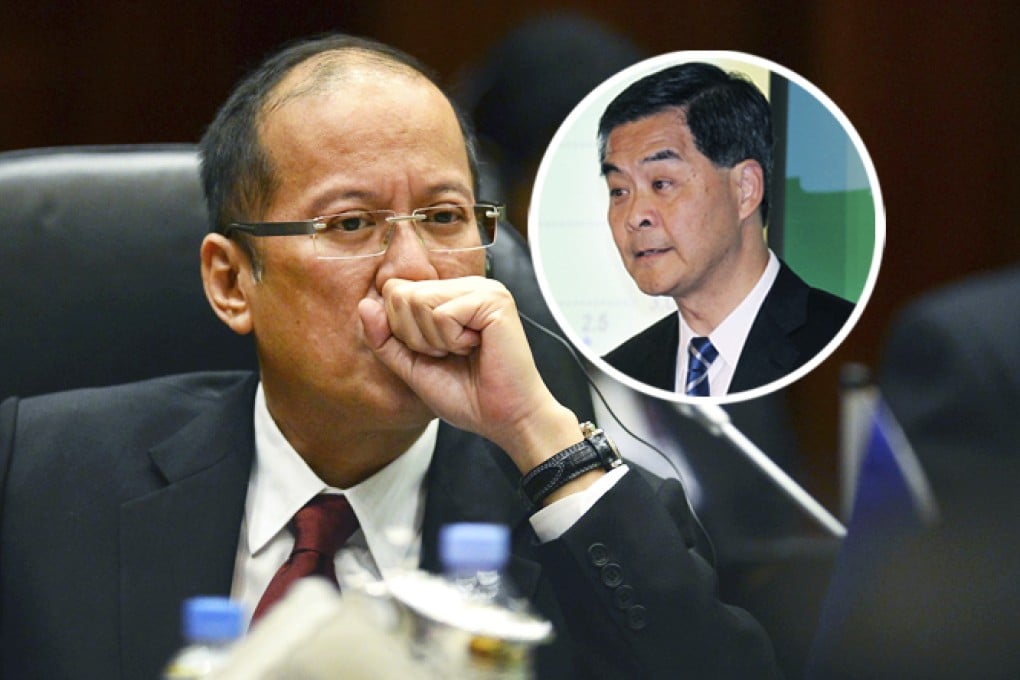 CY Leung and other Hong Kong officials meet Philippine President Benigno Aquino (right) at the Apec summit in Bali. Photo: SCMP Pictures