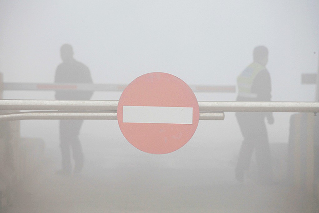 Harbin virtually ground to a halt this week when a pollution index showed airborne contaminants at around 50 times the levels recommended by the World Health Organisation. Photo: AFP