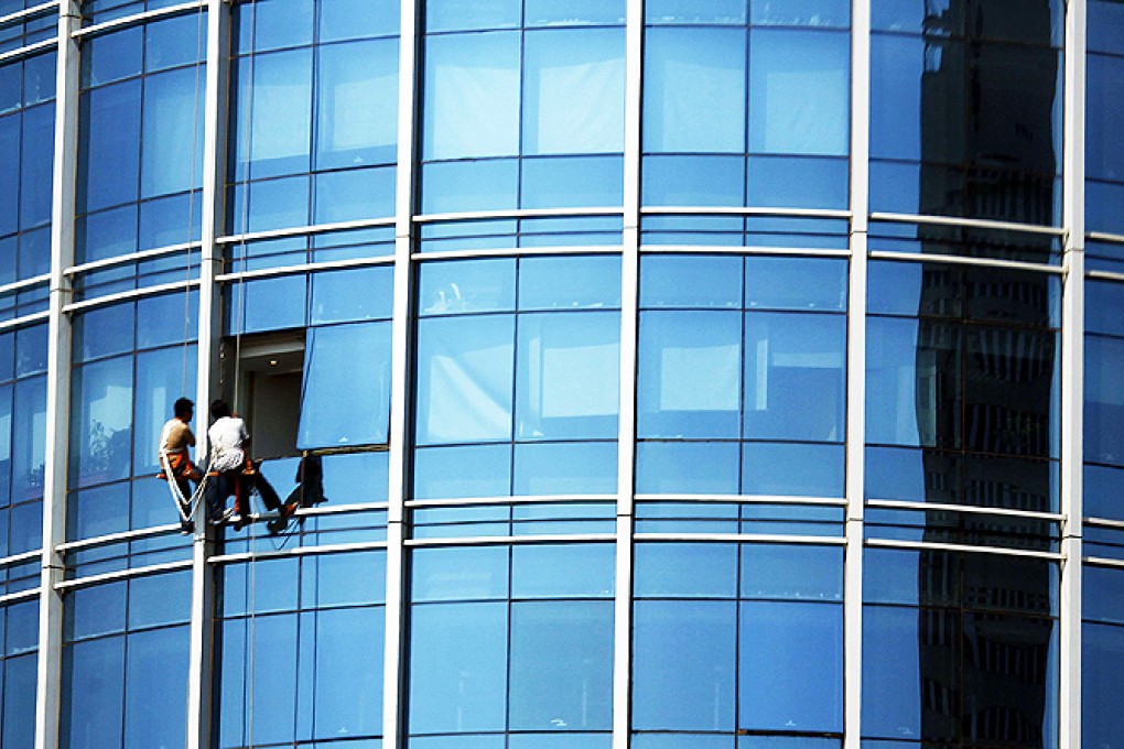 Scientists in China have designed a window that can save and generate energy. Photo: Reuters