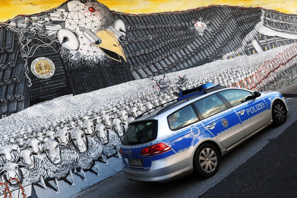 A mural in Cologne depicts the emblematic US eagle with a badge that reads "National Security Agency worldwide". Photo: Reuters