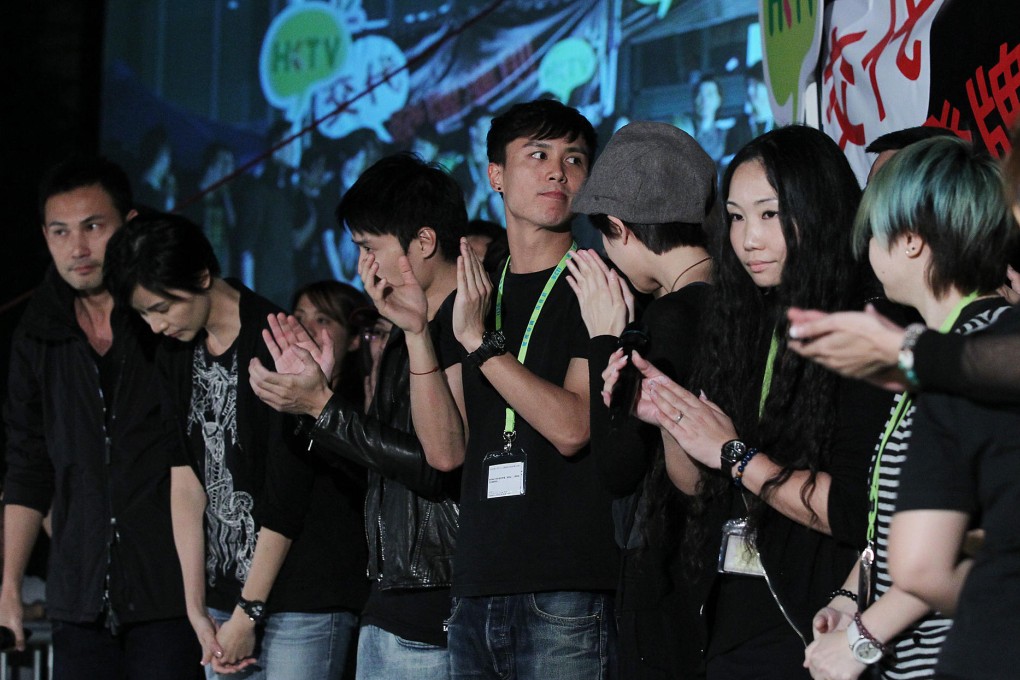 Black-clad protesters at government HQ last night. Photo: K.Y. Cheng