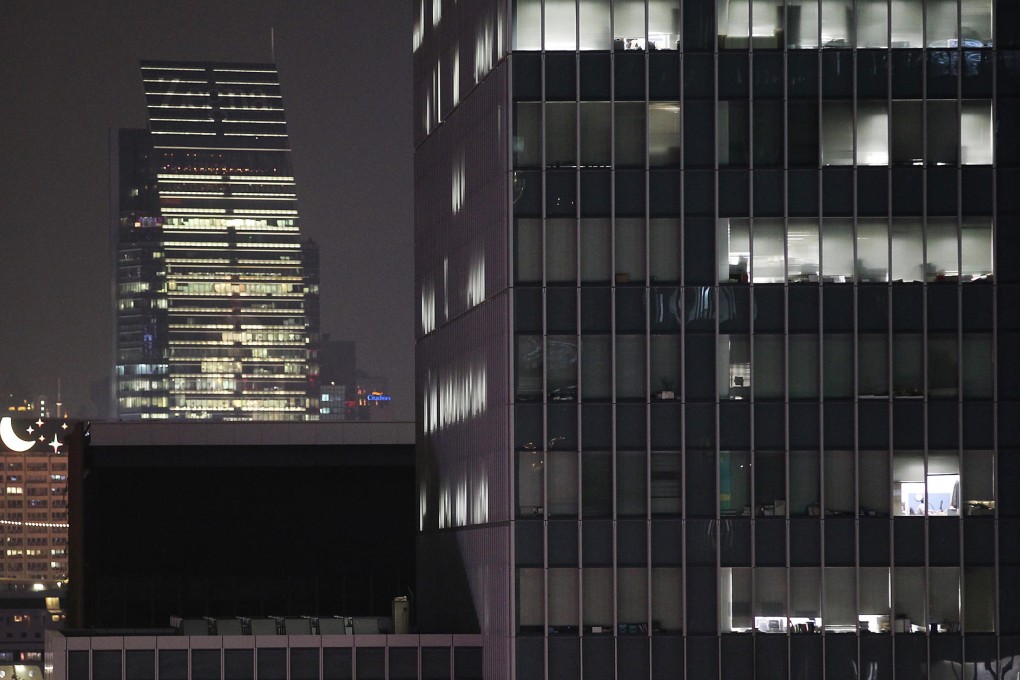Blinds are drawn at the government offices in preparation for filming at the weekend. Photo: K. Y. Cheng