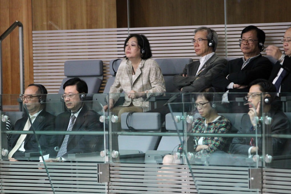 Exco members listen as the chief executive answers questions from lawmakers. Photo: KY Cheng