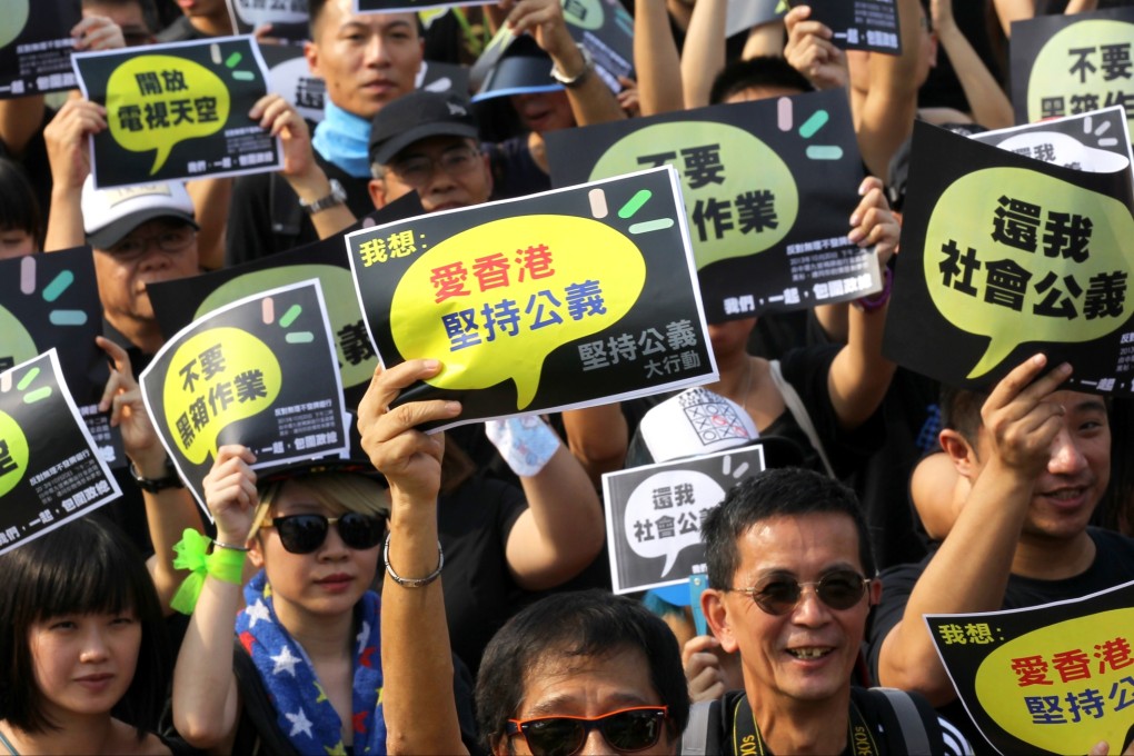 Employees and supporters of HKTV match from Central Pier to government headquarters demanding the government to offer a proper explanation of the rejection of the the station's free-to-air TV license application. Photo: Edward Wong
