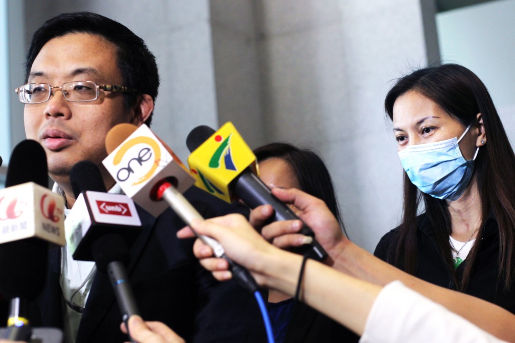 Manila bus hijacking survivor Yik Siu-ling and legislator James To Kun-sun (left) speak to the media. Photo: May Tse