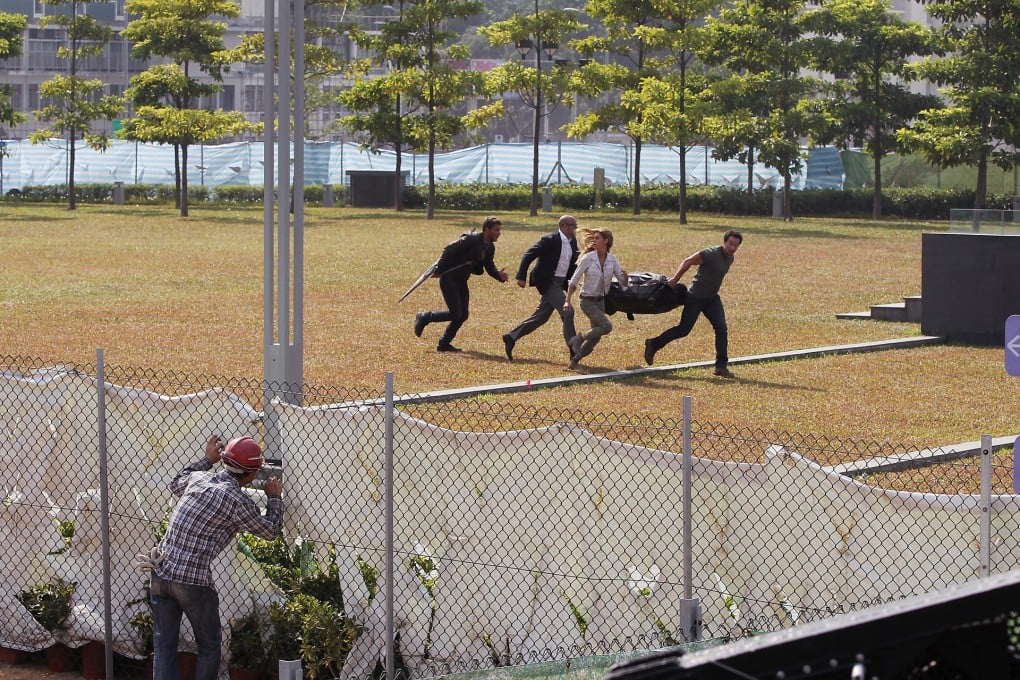 Jack Reynor, Stanley Tucci, Nicola Peltz and Mark Wahlberg on the run. Photo: Sam Tsang
