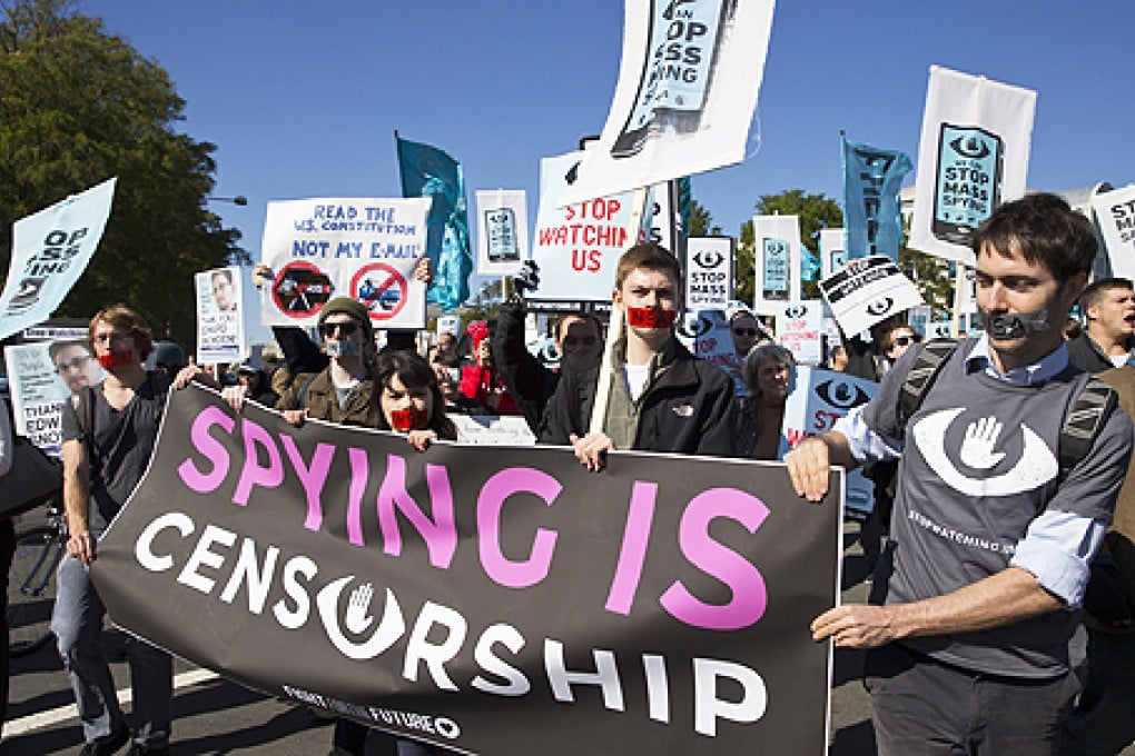 Demonstrators march through Washington on Saturday to demand an investigation into NSA mass surveillance programmes. Photo: AP