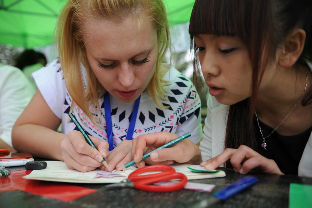 Mainland politicians seem to be shifting the focus away from English back to Chinese. Photo: Xinhua