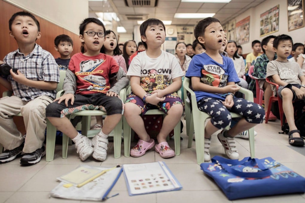 Children attending a class to learn how to speak English with an American accent at the Nature EQ school in Hong Kong. Photo: AFP