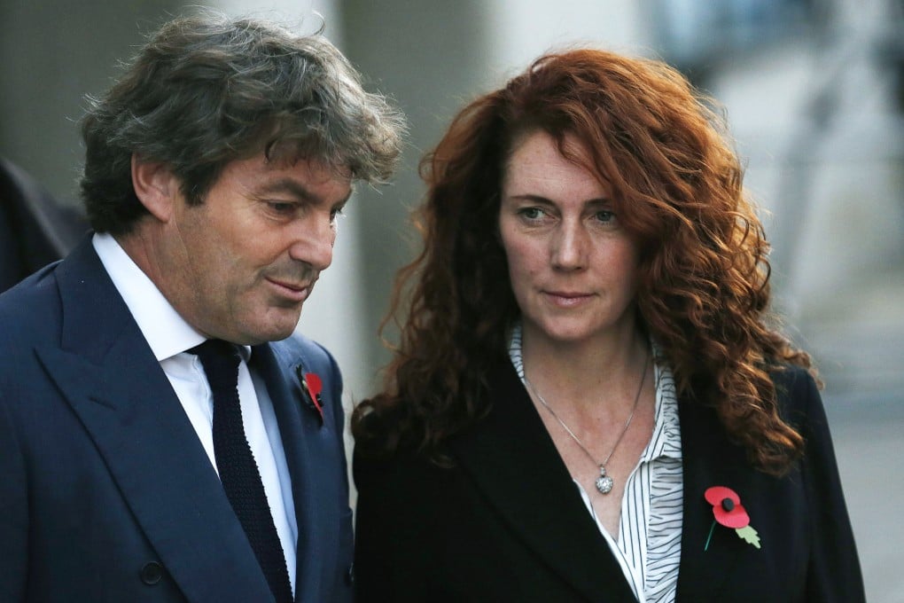 Former News International chief executive Rebekah Brooks and her husband Charlie leave the Old Bailey courthouse in London. Photo: Reuters
