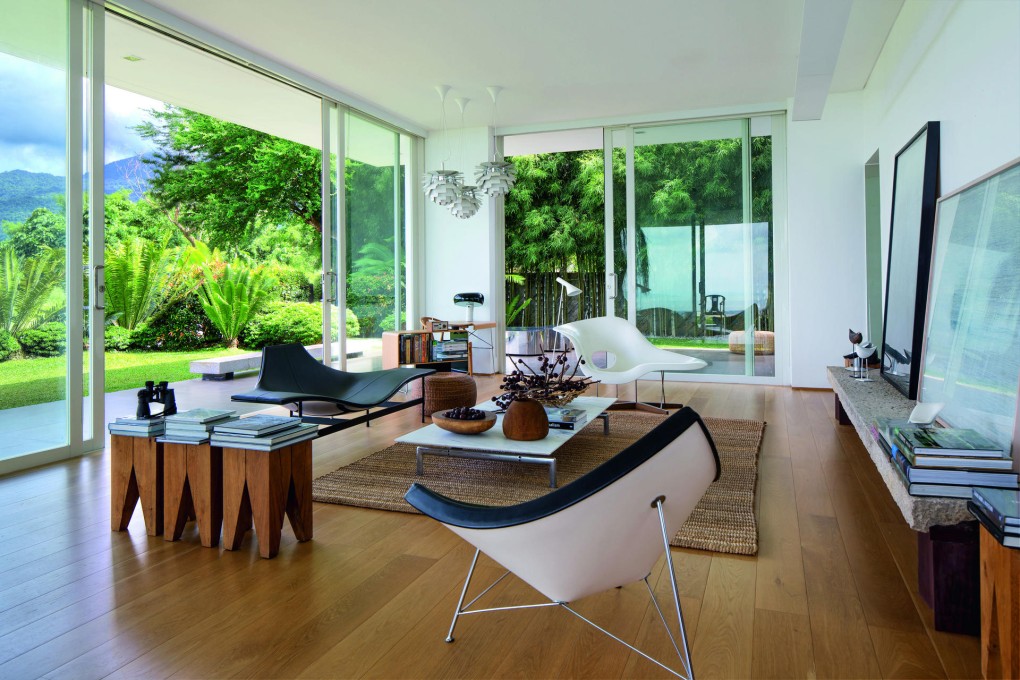 The interior of the Vidal House in Manila, an example of a dwelling which was created by Renato Vidal, who creates domestic objects from natural materials like grass. Photos reproduced from The Sustainable Asian House, published by Tuttle Publishing. Photos by Masano Kawana