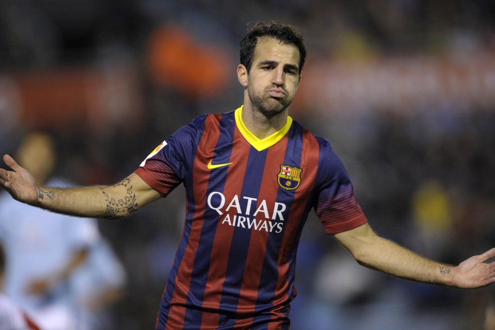 Cesc Fabregas celebrates Barca's third goal. Photo: AFP
