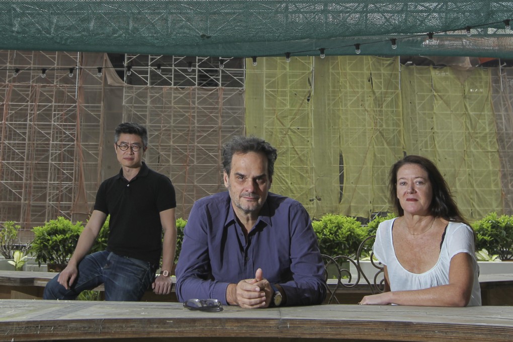 From left: curator Heman Chong with Geoff Lowe and Jacqueline Riva of A Constructed World. Photo: Nora Tam