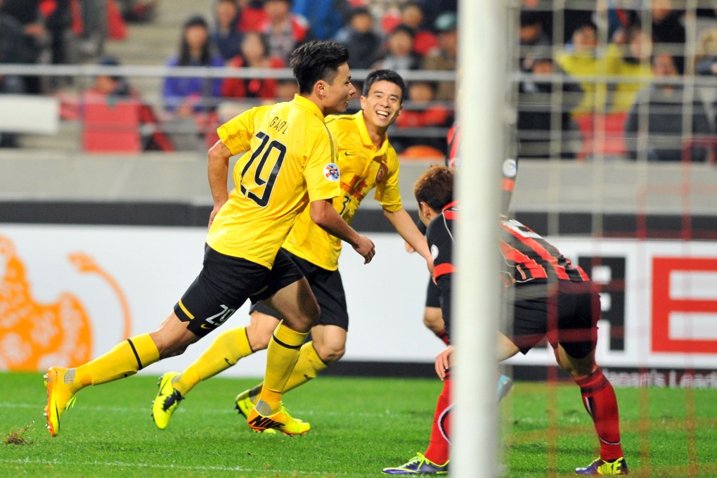 Gao Lin celebrates his goal during the first leg of the AFC Champions League final. Photo: AFP