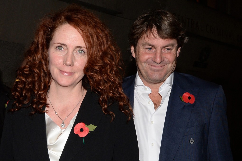 Former chief executive of News International Rebekah Brooks leaves the Old Bailey Central Criminal Court with her husband Charlie. Photo: EPA