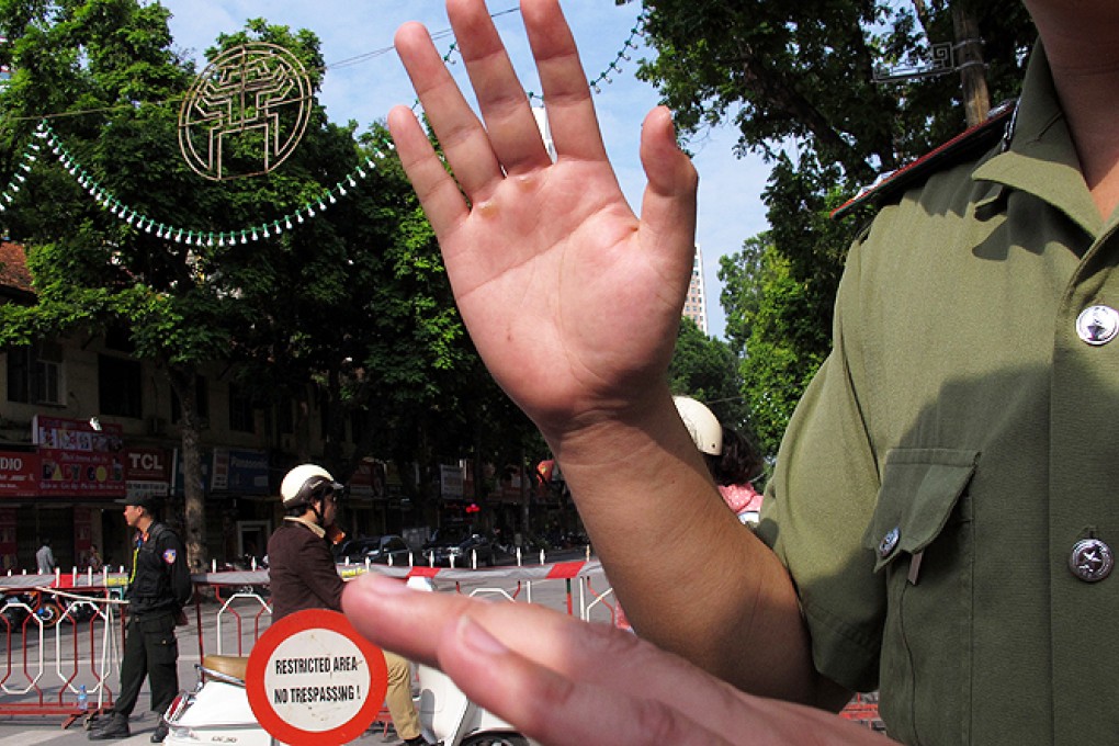 Nguyen Lan Thang recorded a video message shortly before he flew home and told friends to spread it if he was detained. Photo: AP