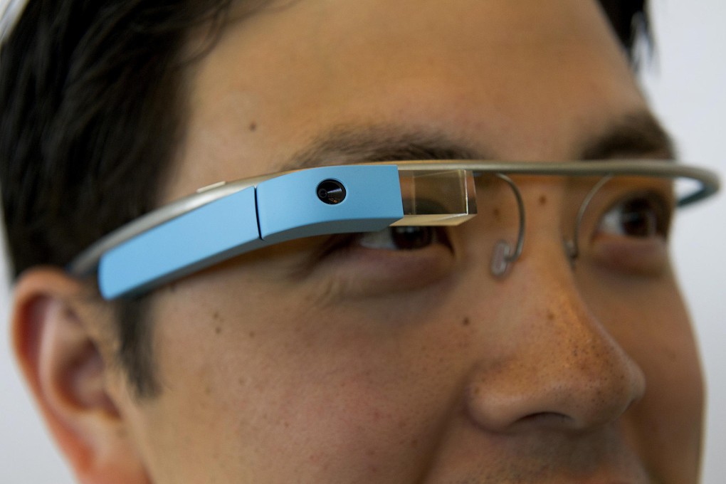Google Glass features a hidden computer and a thumbnail-size transparent display above the right eye. Photo: Bloomberg