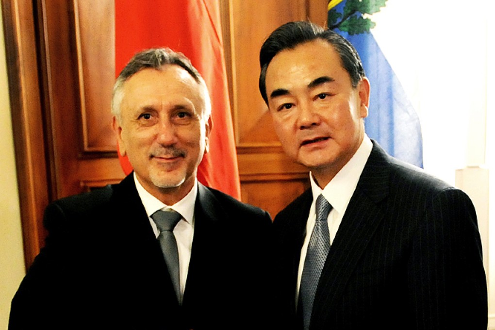 San Marino's foreign minister Pasquale Valentini meets with Chinese foreign minister Wang Yi in San Marino, on Monday. Photo: Xinhua