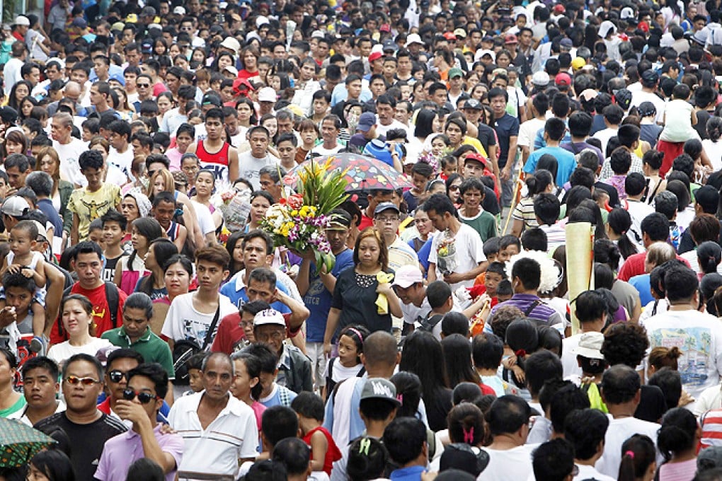 Filipinos flock to remember their departed loved ones on All Saints Day at North cemetery in Manila, on Friday. Photo: Reuters
