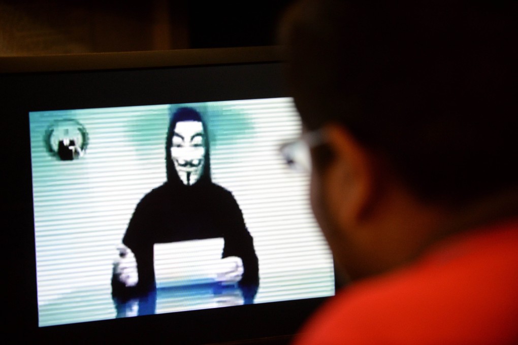 The YouTube video in which a person claiming to speak for Anonymous warns Singapore. Photo: AFP