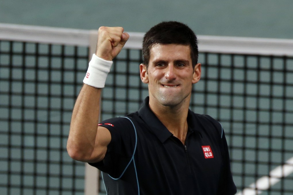 Novak Djokovic of Serbia celebrates defeating Roger Federer of Switzerland in their semi-final match at the Paris Masters tournament. Photo: Reuters