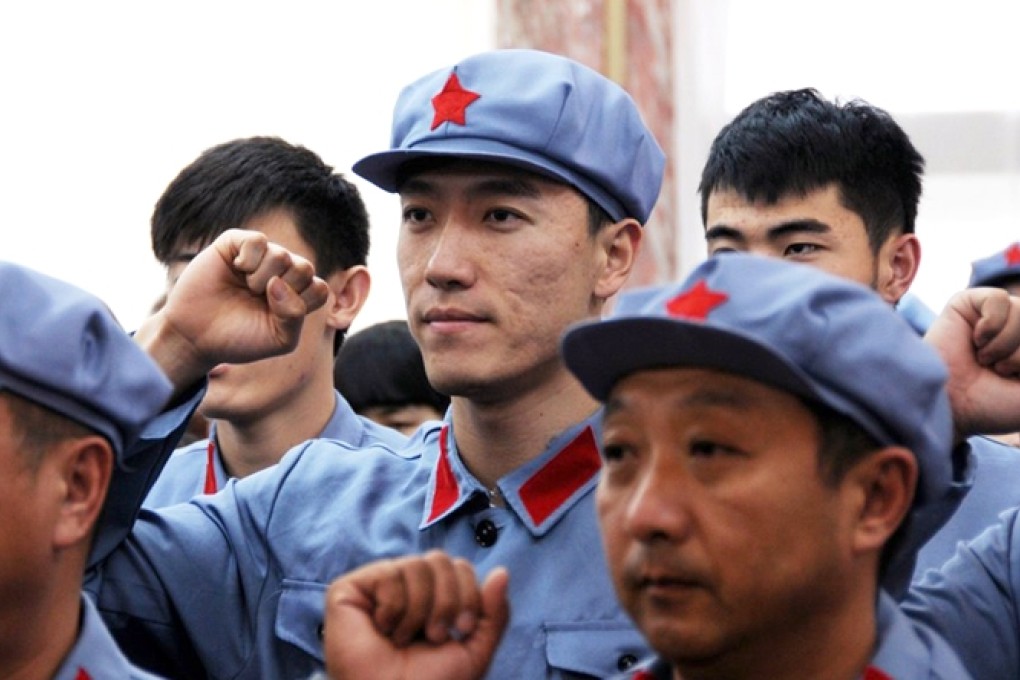 Liu Xiang (centre) participated in an motivational convention held in Jinggangshan on Sunday. Photo: Xinhua