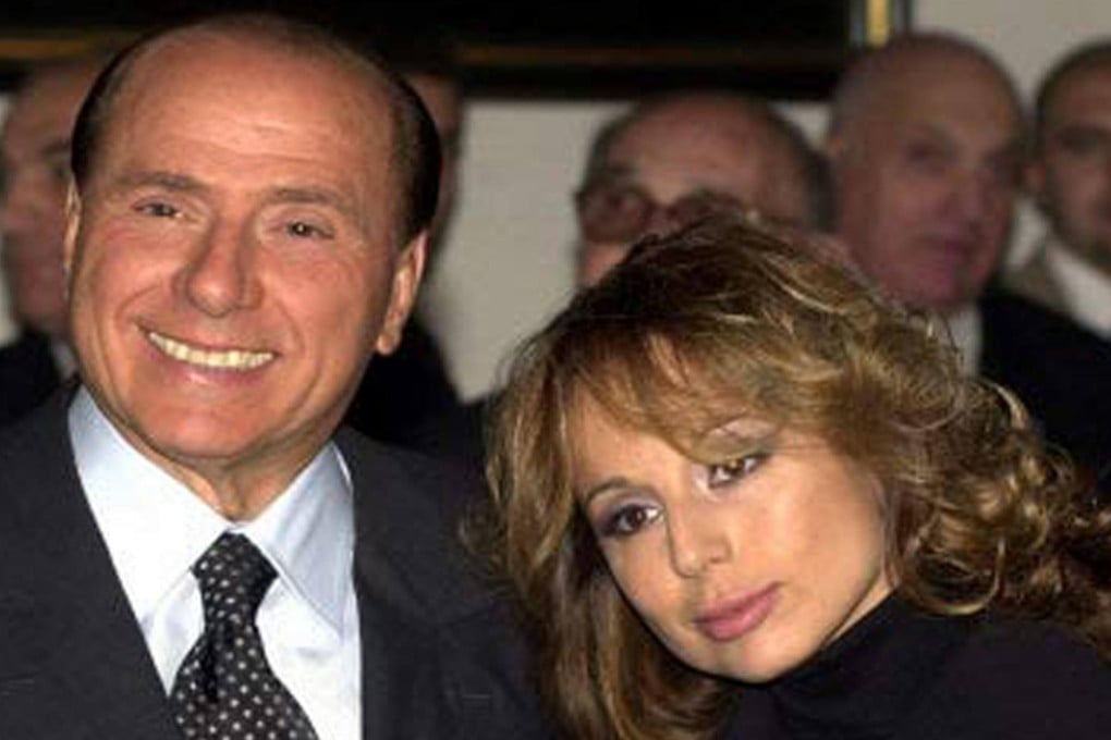 Silvio Berlusconi (left) and his daughter Marina.