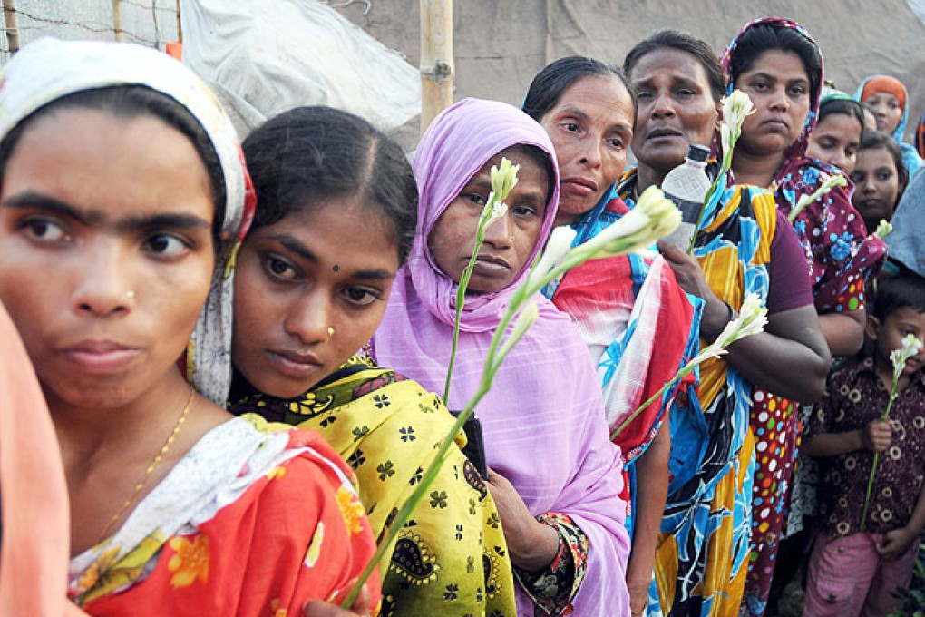 Protests over poor wages, benefits and working conditions in Bangladesh have gained in intensity since the April collapse of a factory complex that killed 1,135 people. Photo: Xinhua