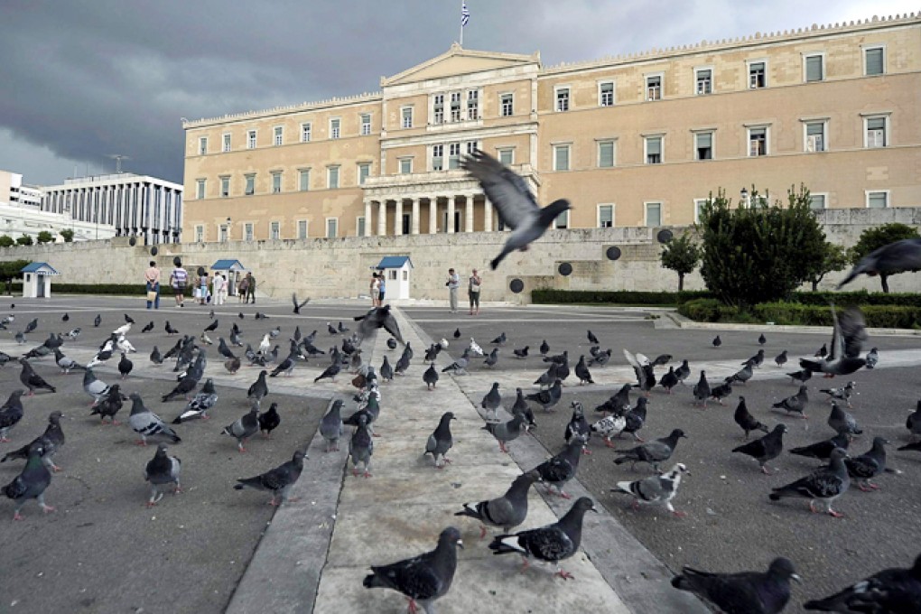 The Greek parliament has seen politicians vent their anger over budget cuts and these political tensions are mirrored in the other debt-burdened EU members. Photo AFP