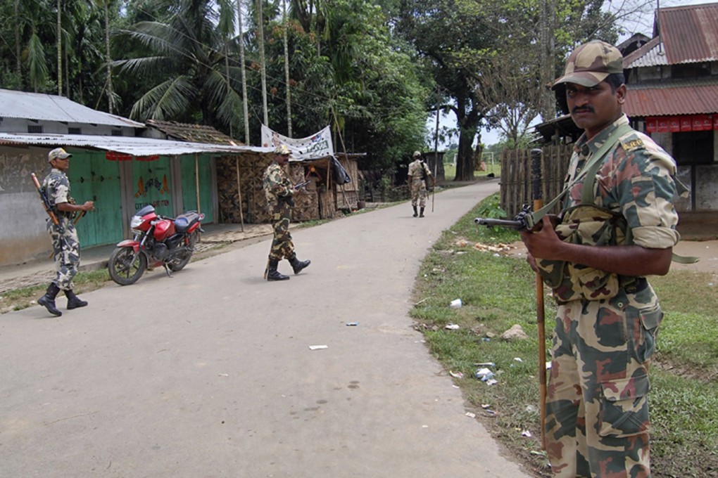 Indian police in Assam. Militants from separatist group the Garo National Liberation Army killed seven villagers in Golapara district of Assam state. Photo: Reuters