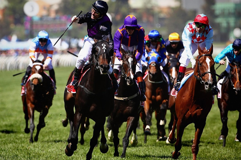 Damien Oliver is over the moon after riding Fiorente to victory in the Melbourne Cup on Tuesday. Photo: EPA