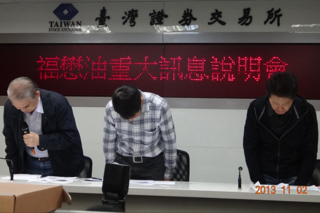 Formosa Oilseed Processing executives apologise after mislabelling their products as pure. Photo: CNA