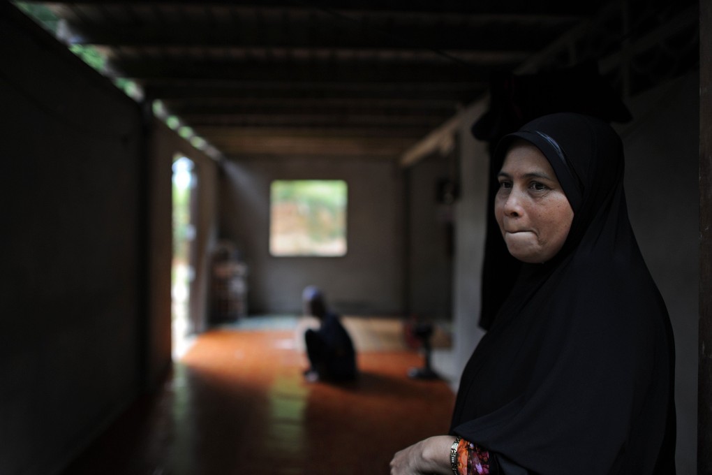Thai Muslim woman Mariyea Bersa, the mother of Lookman and Samree Dueramae who were shot dead in a police-led raid last year. Photo: AFP