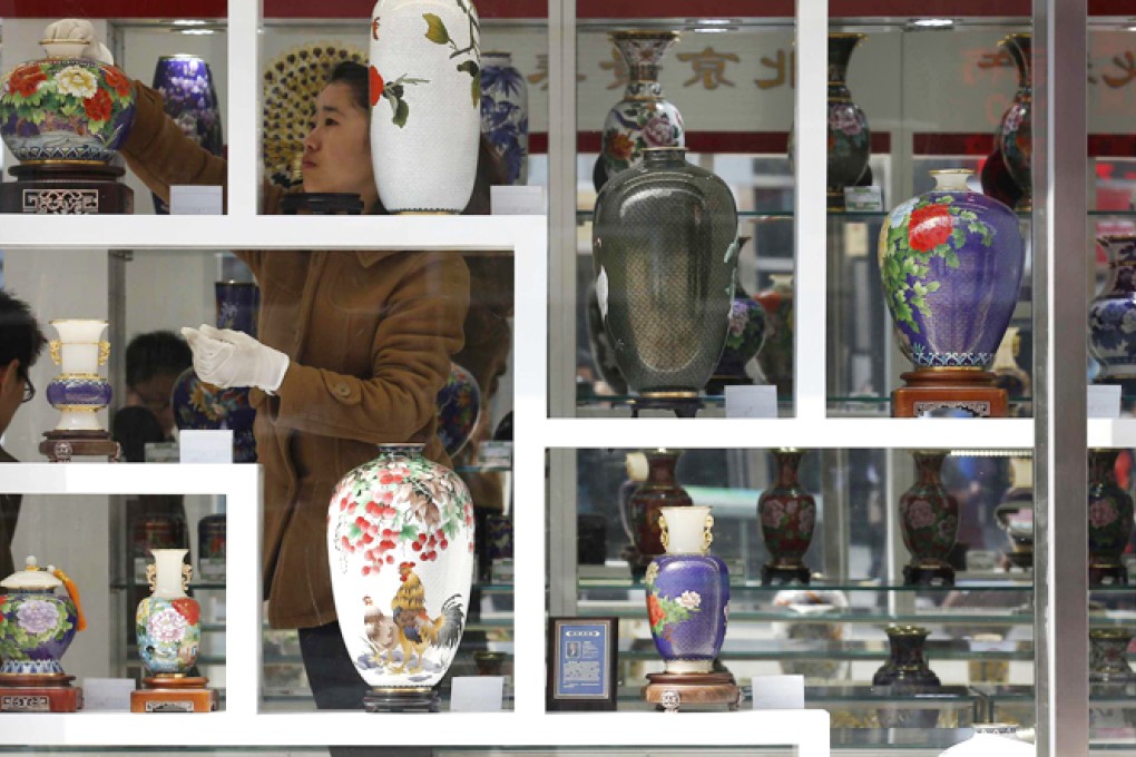 China's services industry has so far weathered the global growth slowdown much better than the factory sector. Photo: Reuters