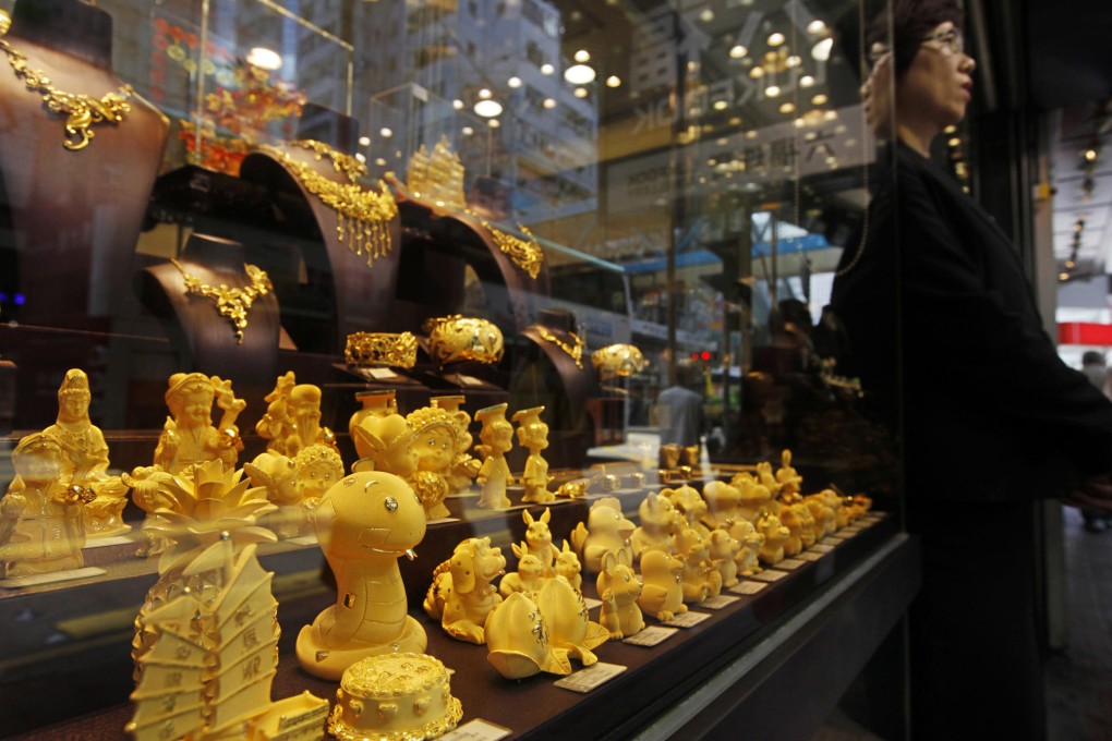 Gold on display in Hong Kong. Luk Fook's stake in the operator of 3D-Gold will boost its mainland stores to more than 1,400. Photo: AP