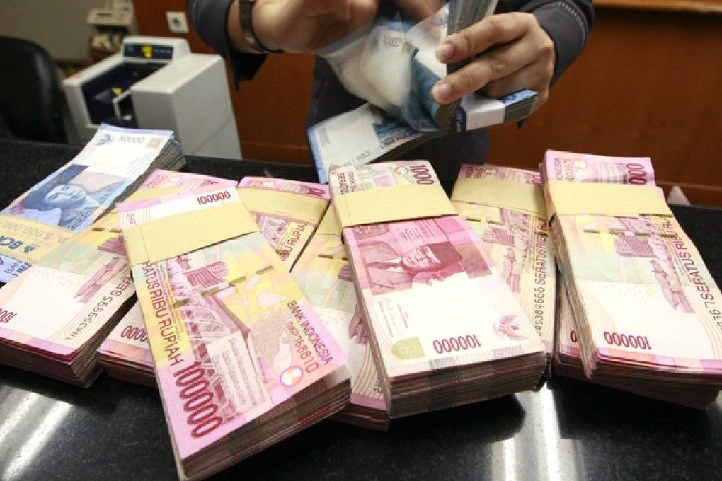 The rupiah is 14 per cent weaker than its May high. Photo: EPA
