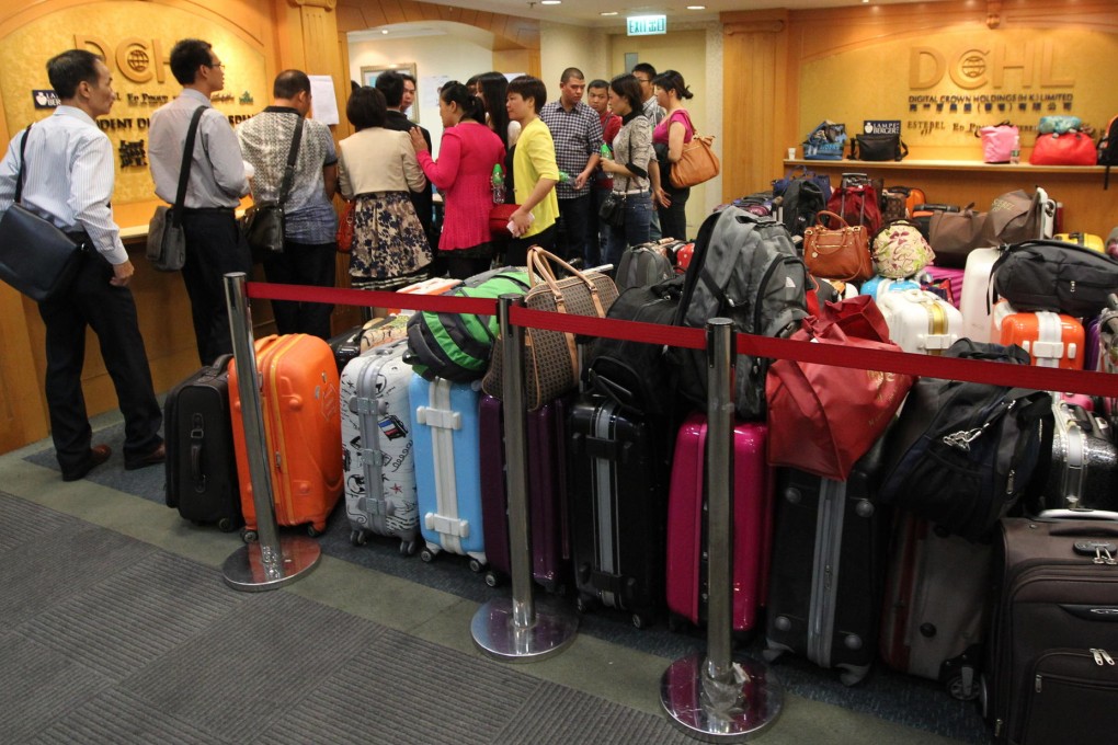 Order resumes at the DCHL office in Paliburg Plaza at Causeway Bay yesterday. Photo: Nora Tam