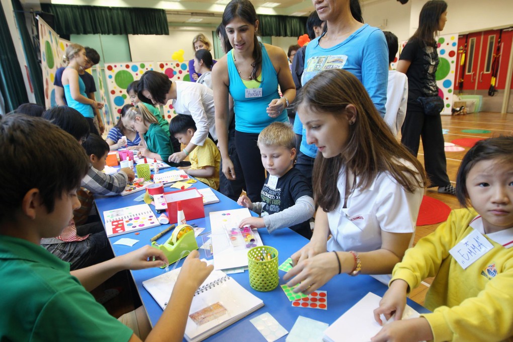 Children enjoy an art-therapy session provided by the Joshua Hellman Foundation at the Jockey Club Sarah Roe School. Photo: Jonathan Wong